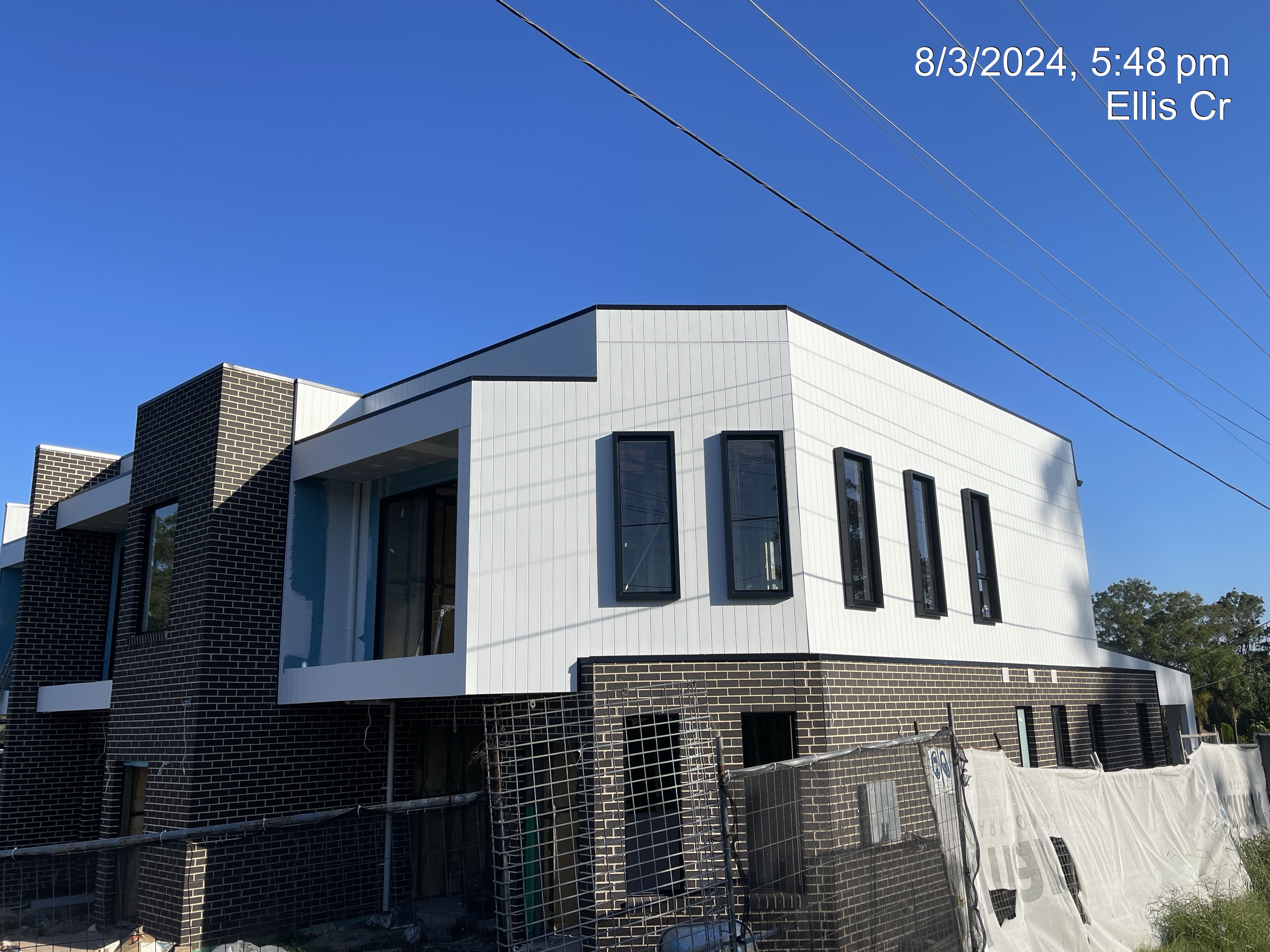 Duplex development with brick base and vertical cladding, Ellis Cr